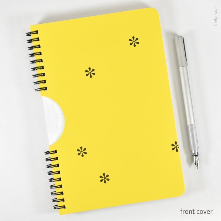 Black Asterisks Weekly Planner with Yellow Cover (