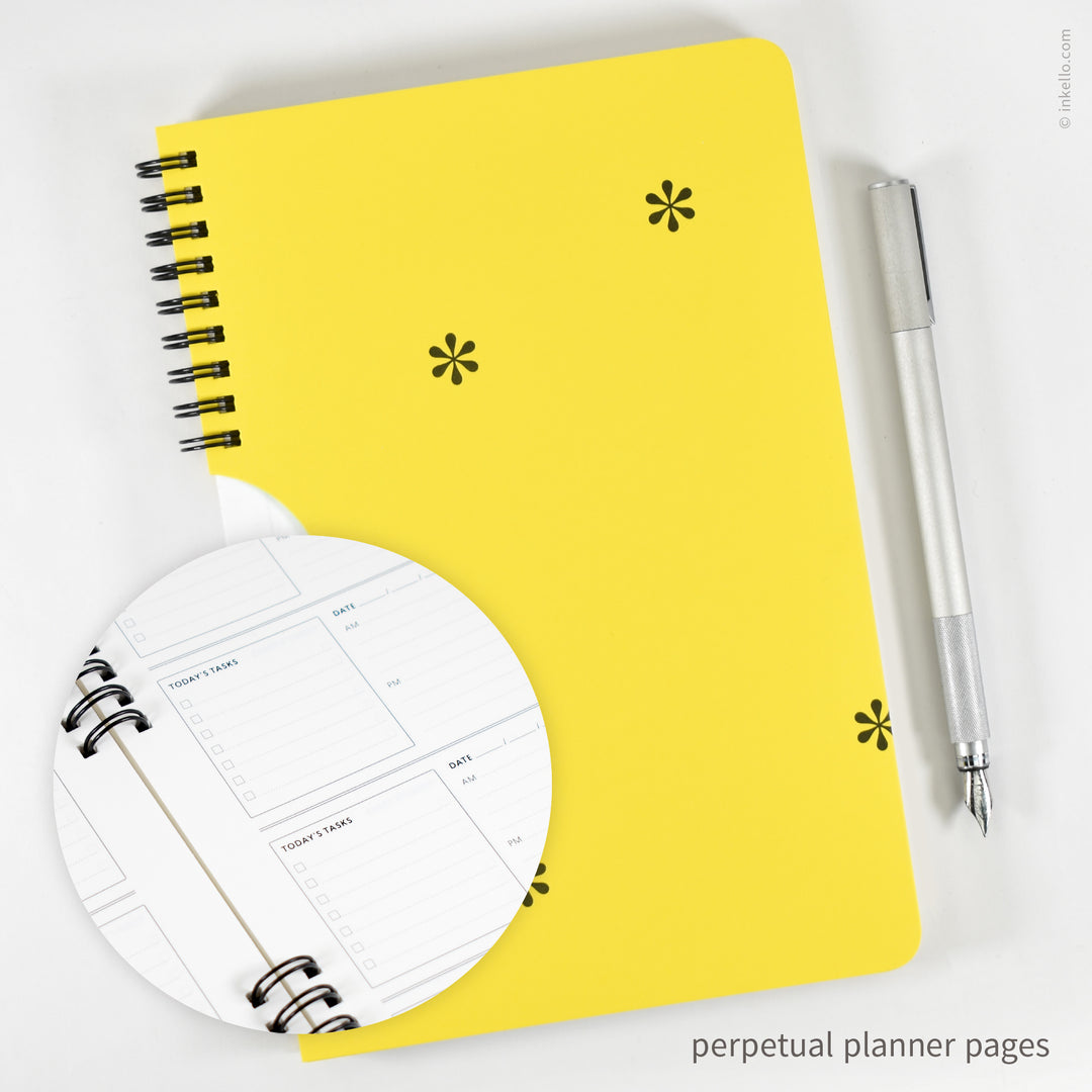 Black Asterisks Weekly Planner with Yellow Cover (