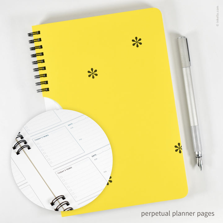 Black Asterisks Weekly Planner with Yellow Cover (
