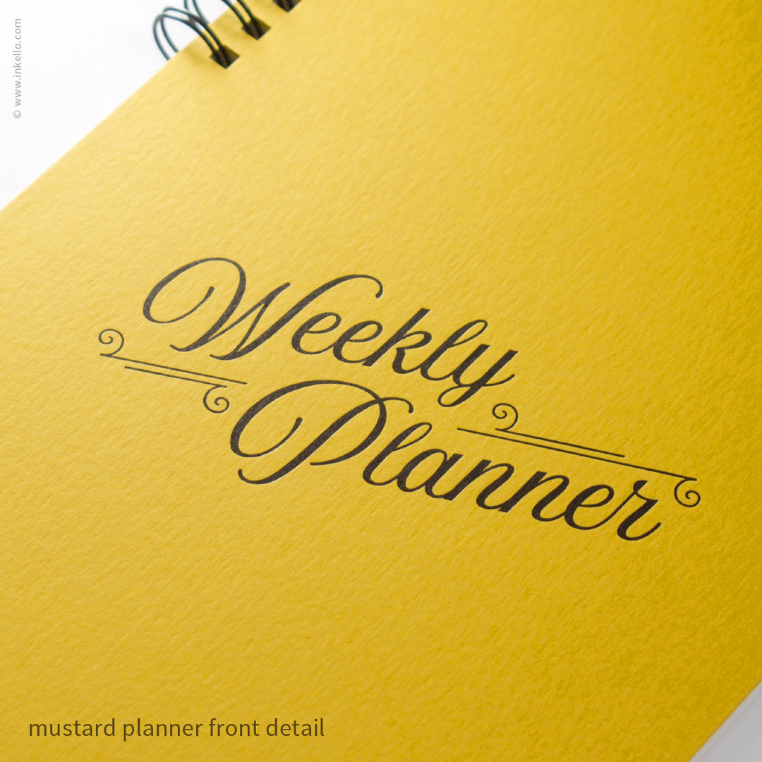 Weekly Planner with Mustard Cover and Black Script Design (