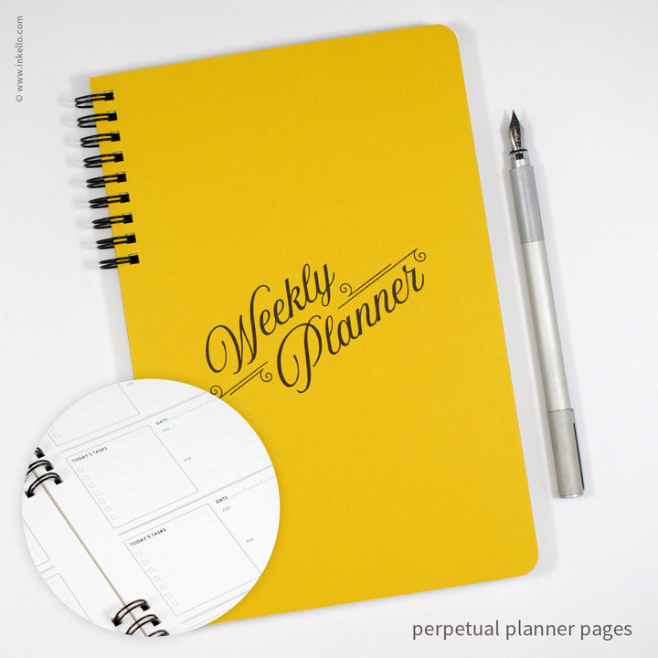 Weekly Planner with Mustard Cover and Black Script Design (