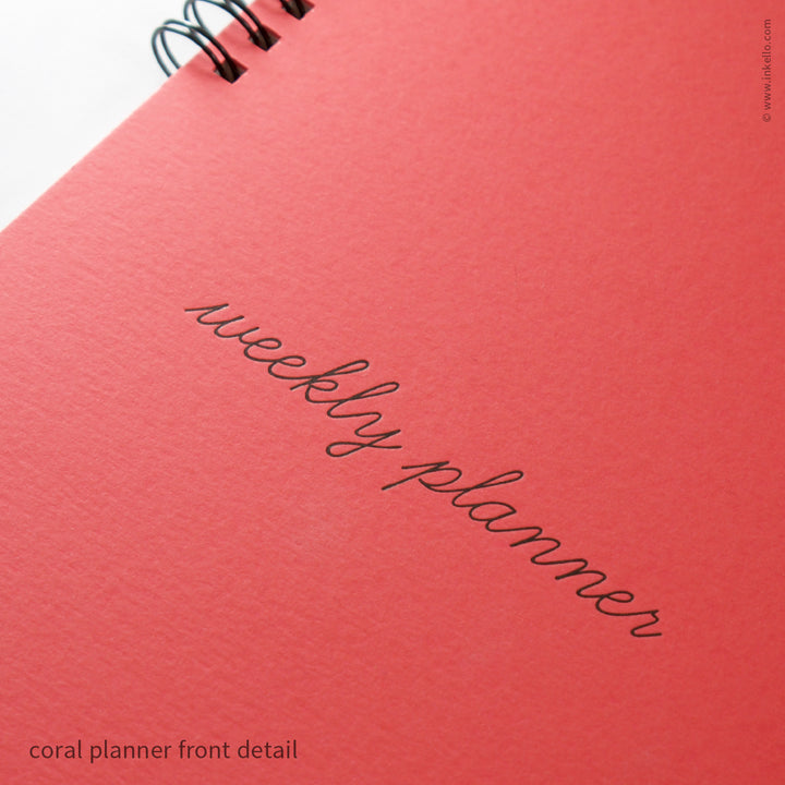Weekly Planner with Coral Cover and School Cursive in Black Ink (