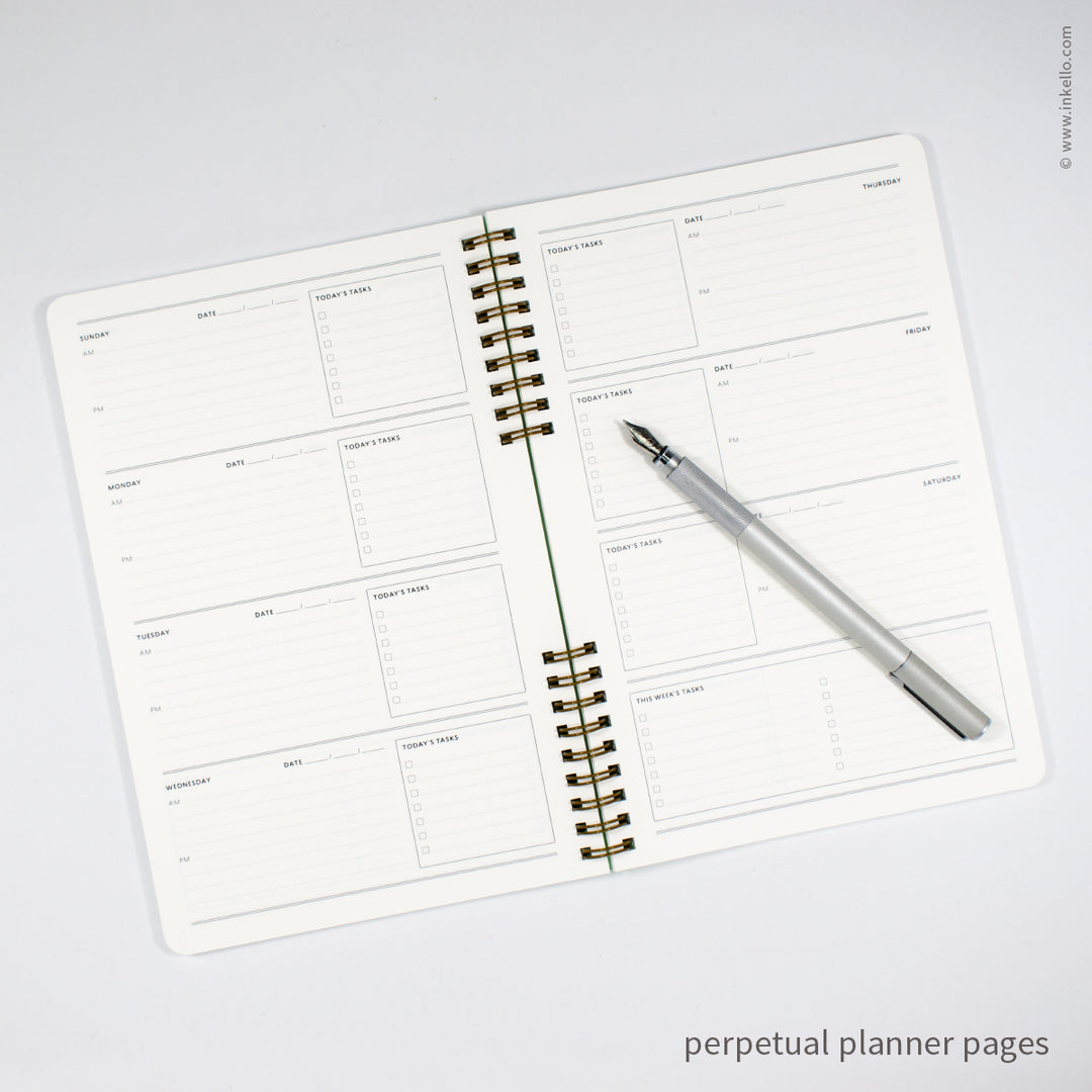 Weekly Planner with Mint Cover and T.S. Eliot Quote in Navy Ink (