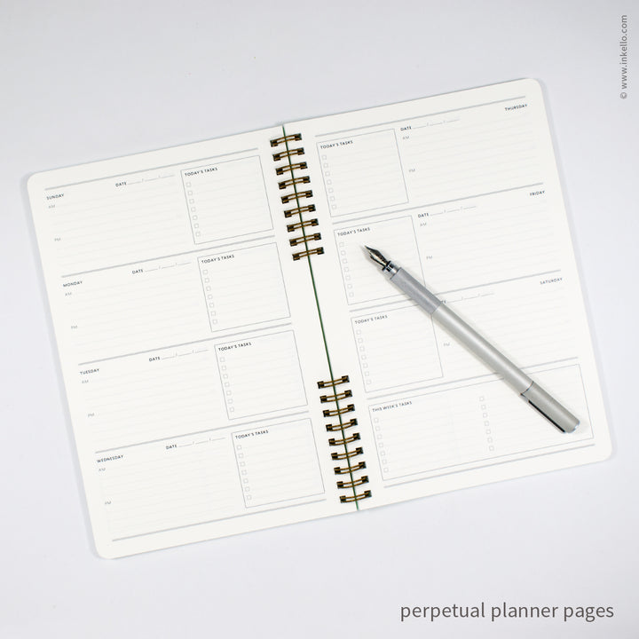 Weekly Planner with Mint Cover and T.S. Eliot Quote in Navy Ink (